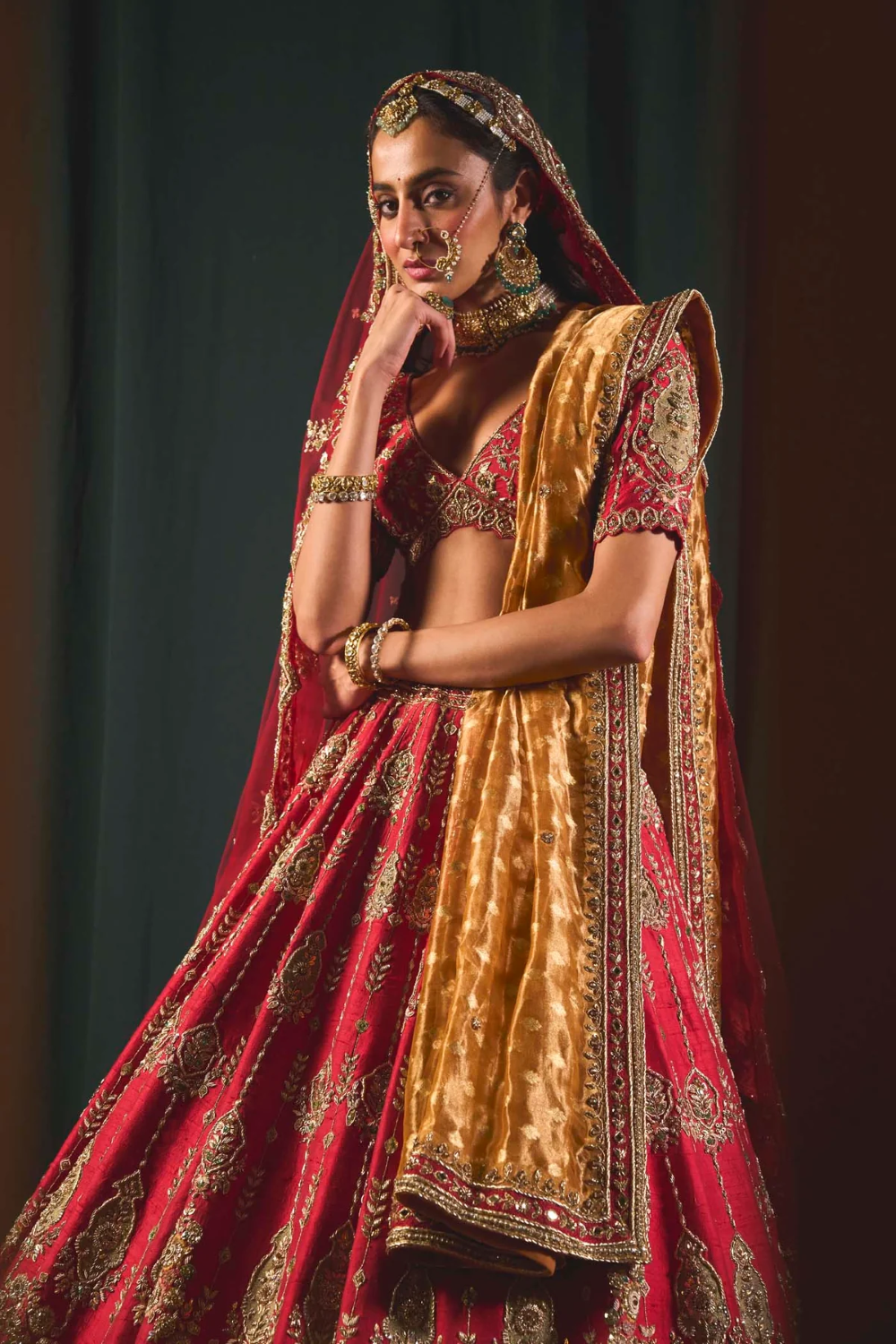 Dreamy zardosi and zari red bridal lehenga