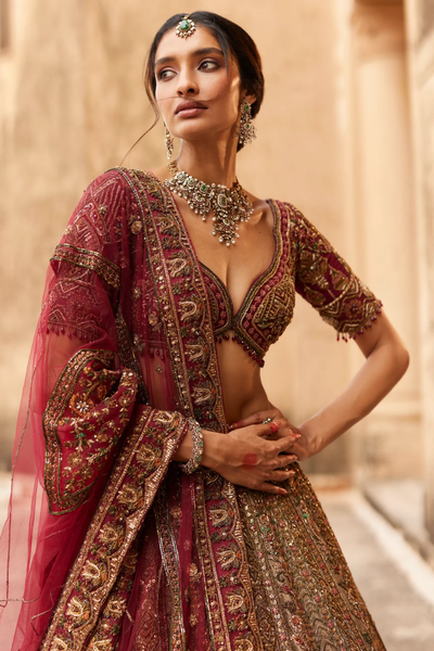Gold lehenga with resham and zari bridal lehenga